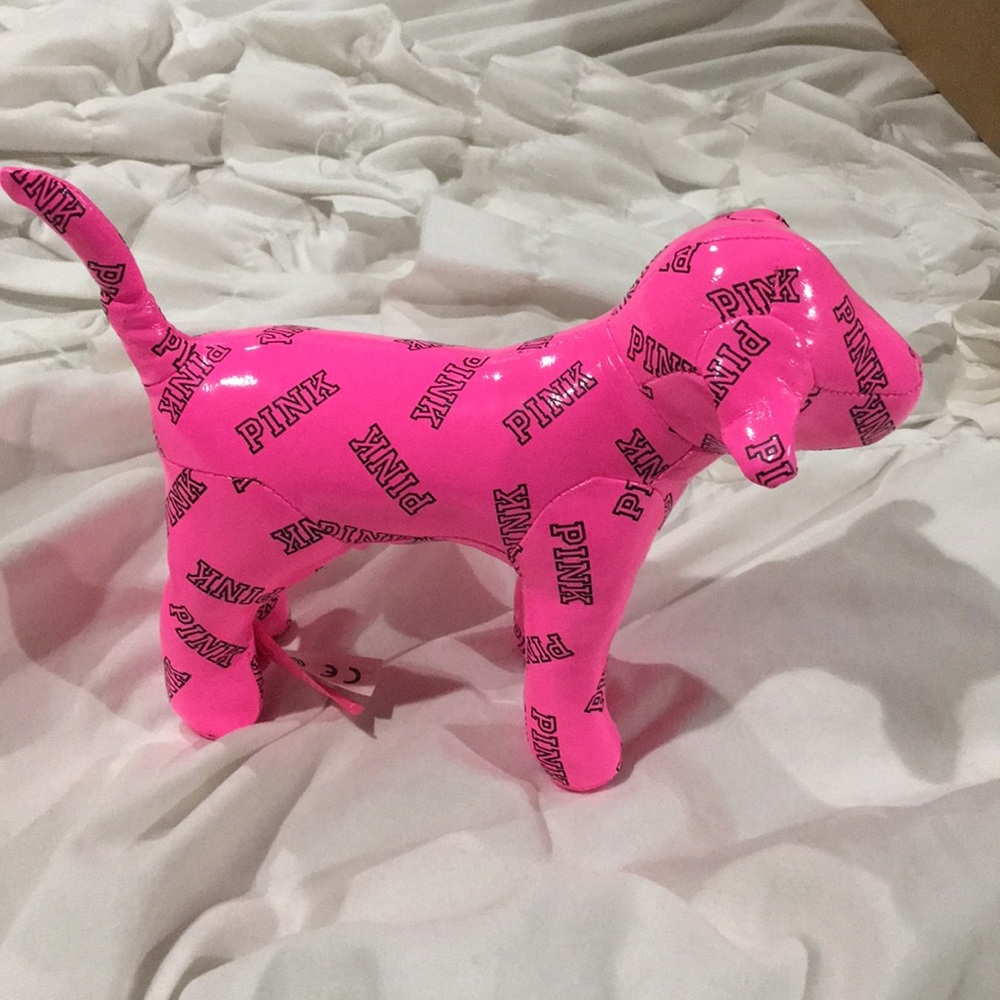 Pink vs dog small about 8” Long